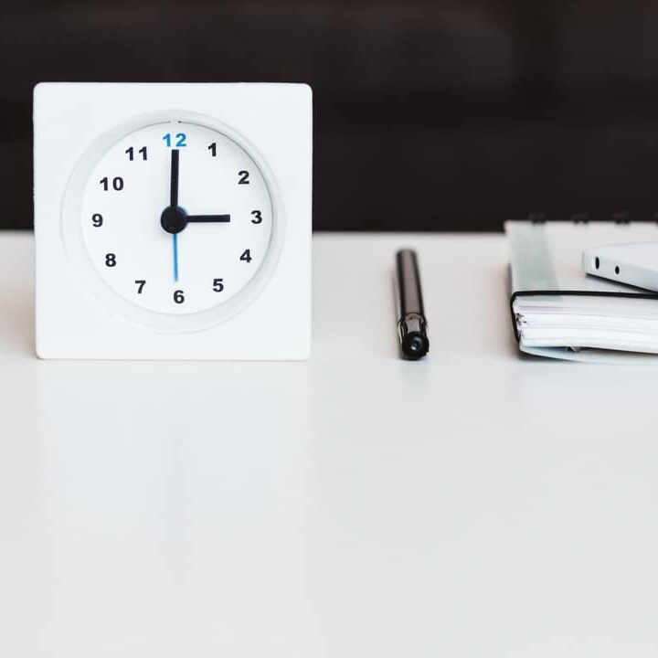 Clock and paperwork