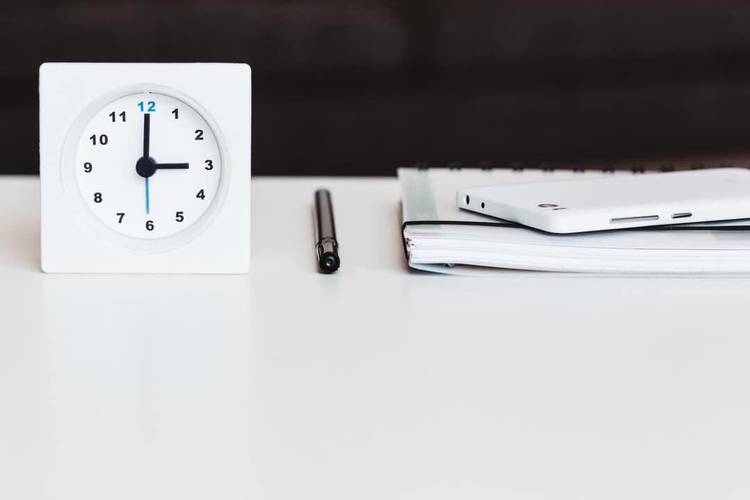 Clock and paperwork