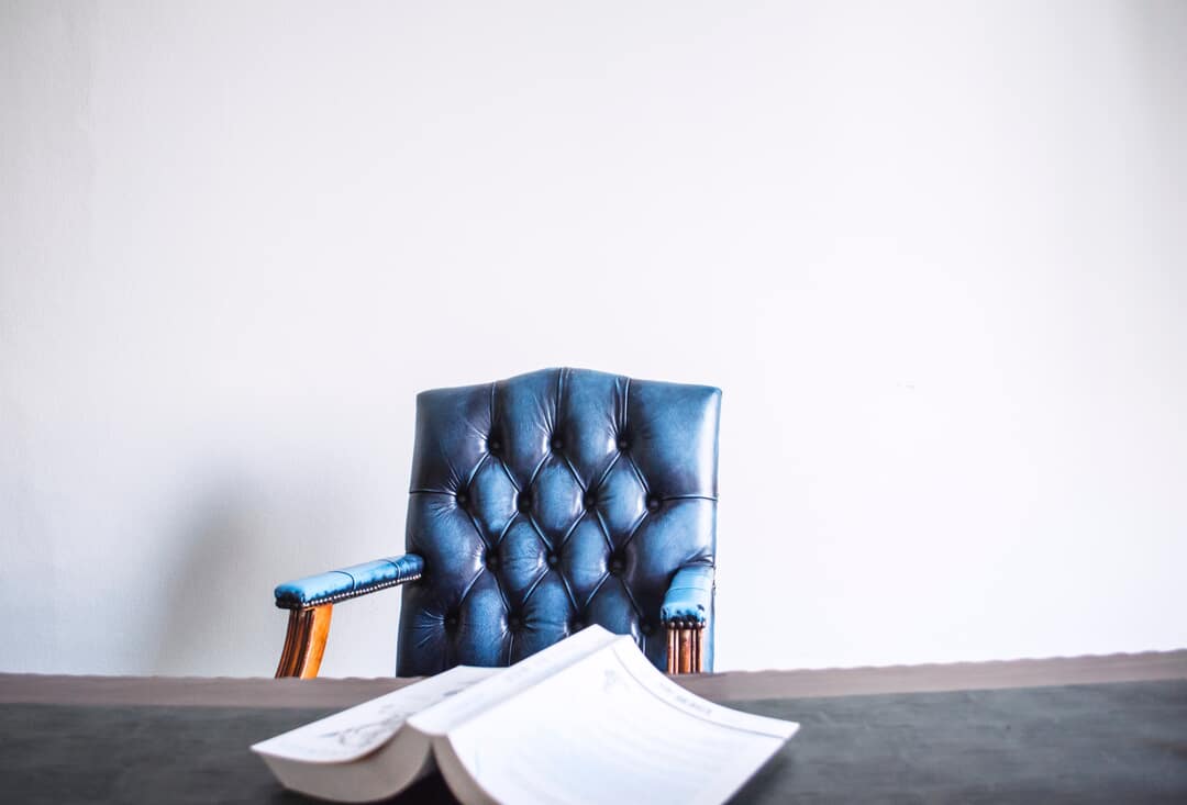 Blue Leather Armchair and Book